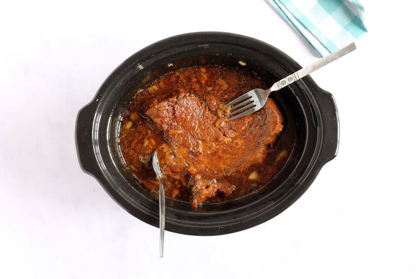 Cooked beef in slow cooker