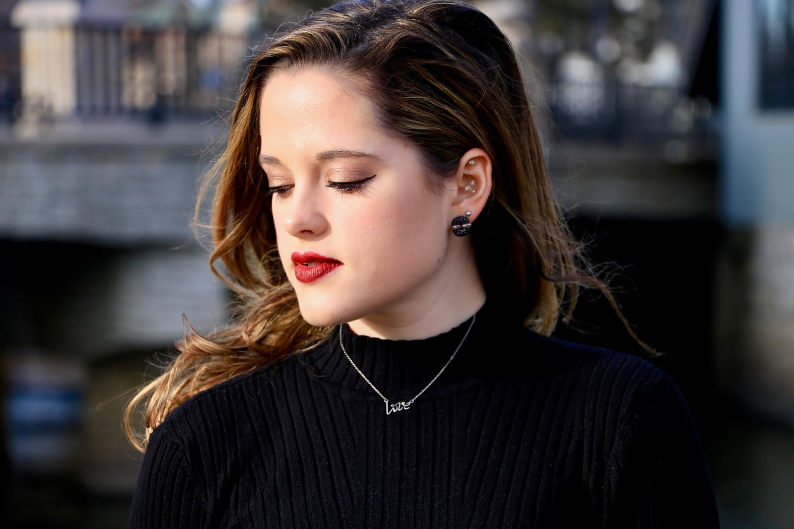 Nyc fashion blogger Kathleen Harper wearing a Tiffany & Co. silver Love necklace.