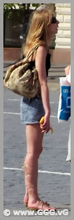 Girl in jean mini skirt on the street