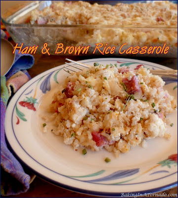 Ham and Brown Rice Casserole includes ham, rice and cauliflower baked together in a cheesy casserole. | Recipe developed by www.BakingInATornado.com | #recipe #dinner