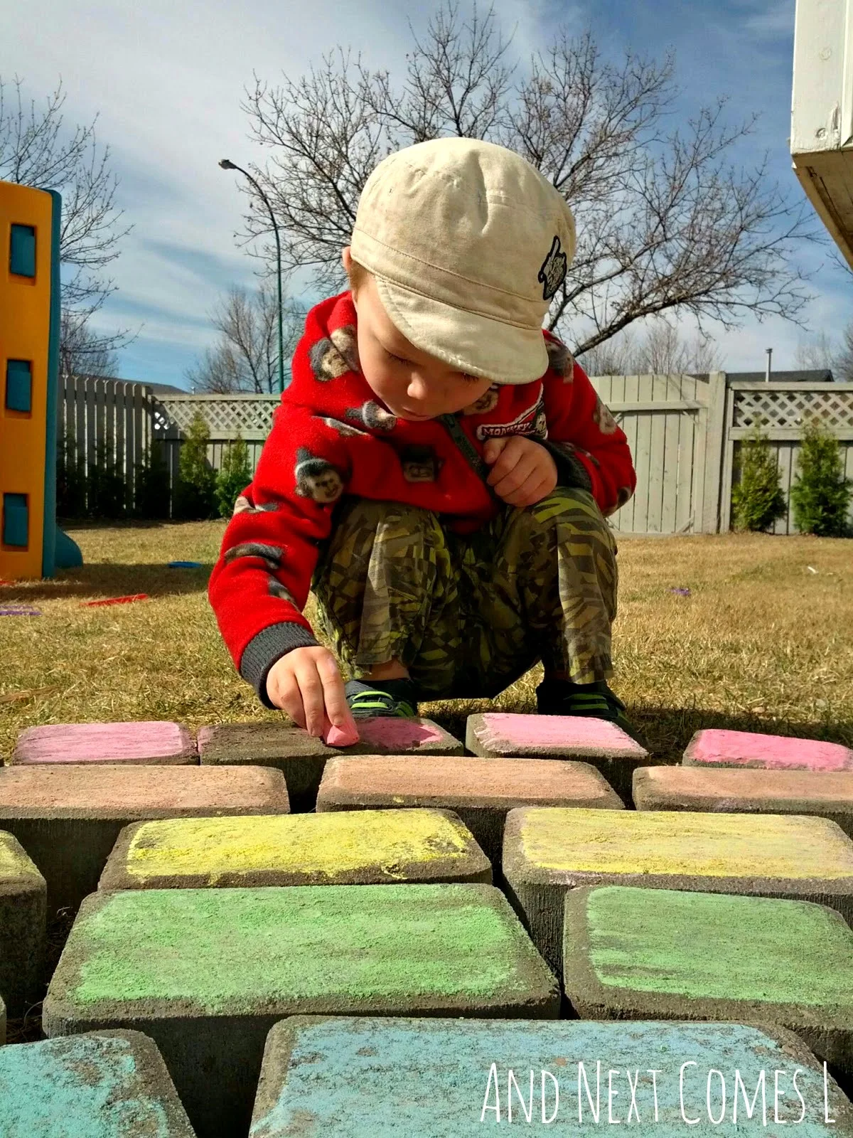 Coloring a giant chalk rainbow from And Next Comes L