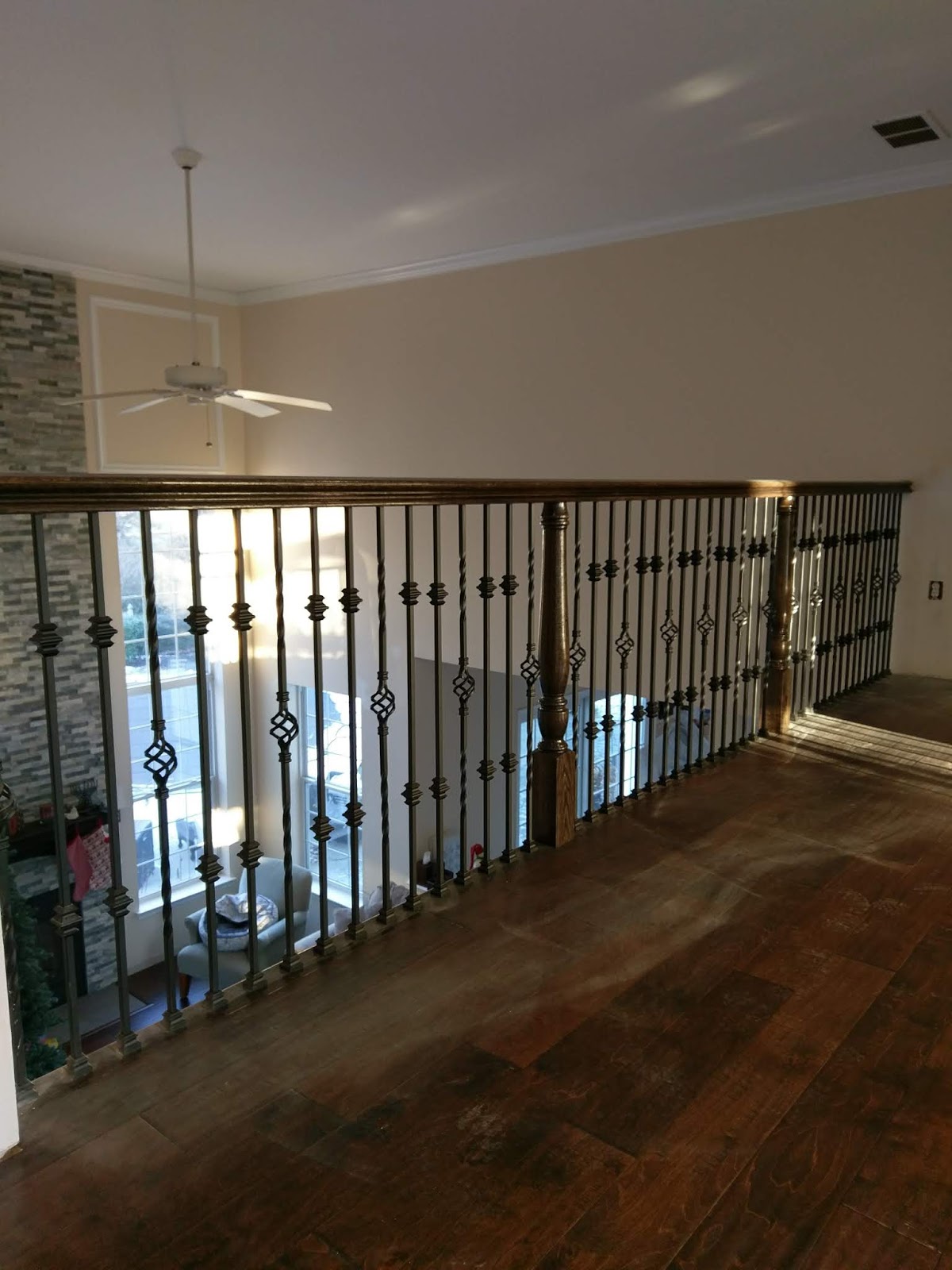 Wood Stairs and Rails and Iron Balusters