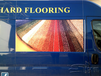 Farley's furniture selection of carpets printed photograph fitted to thier van.