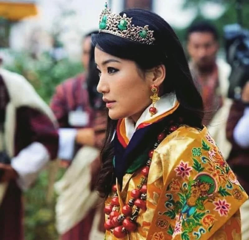 Queen Jetsun Pema of Bhutan (The Gyaltsuen or Dragon Queen), diamond gold tiara, gold earrings
