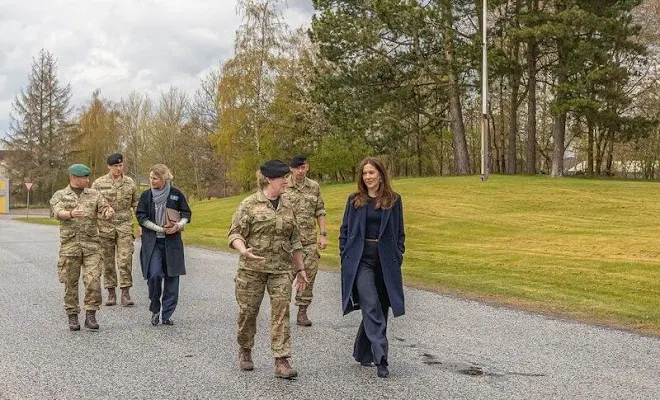 Crown Princess Mary wore a new navy wool cuff ribbed sweater with embroidery from Chloe. Dulong Esme baracelet with diamonds