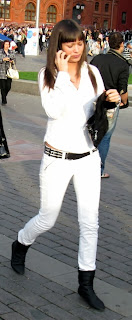 Girl in white tight jeans on the street