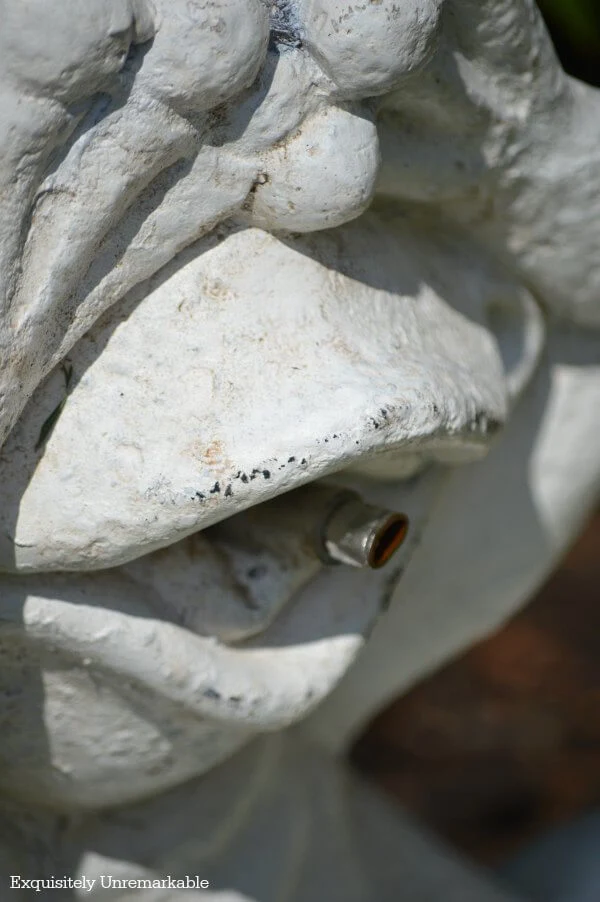 Metal Piece Crimped In Fountain Mouth