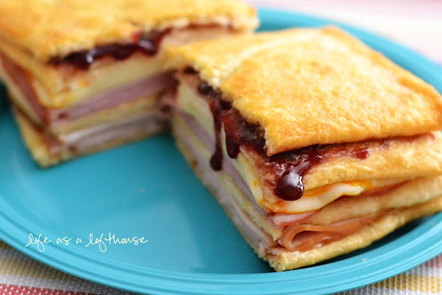 Monte Cristo Sandwiches are buttery flaky crescents filled with ham, turkey, cheese and raspberry jam. Life-in-the-Lofthouse.com