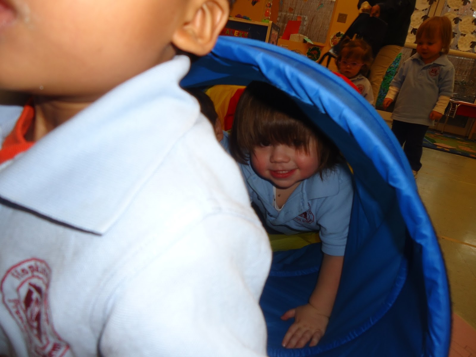 to the HH Toddler Classroom! Crawling through the tunnel
