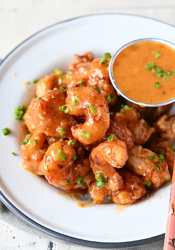 top view of a white plate with best and easy bang bang shrimp