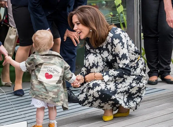 Crown Princess Mary wore Gianvito Rossi Pumps in Yellow, floral printed dress. Crown princess Victoria wore silk blouse