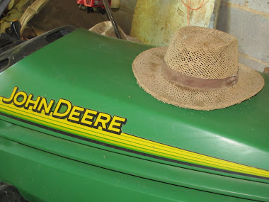 John Deere and Farmer's Hat