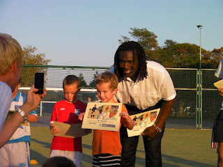 getting certificate from Linvoy Primus premiership footballer