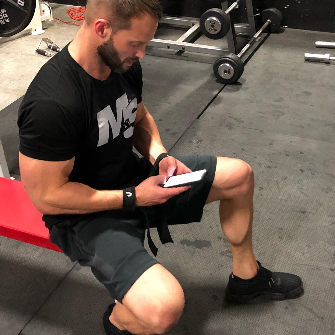 masculine-straight-daddy-whitney-reid-hunky-gym-man-texting