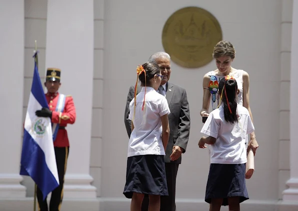 Queen Letizia of Spain and Salvador Sanchez Ceren President of El Salvador attend an official welcome ceremony at Presidential Palace 