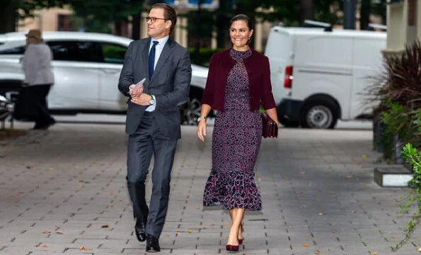 Princess Victoria wore a printed midi dress from By Malina. Rizzo Azelia suede pumps and Saturn earrings. By Malina Lysandra dress