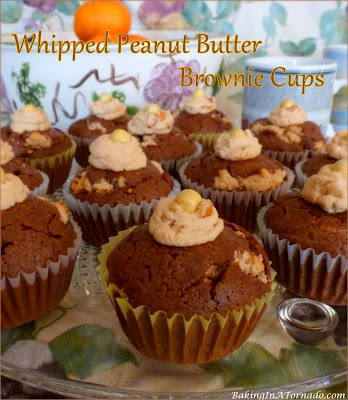 Whipped Peanut Butter Brownie Cups bake a creamy whipped peanut butter center into chocolatey brownie cups. | Recipe developed by www.BakingInATornado.com | #recipe #dessert