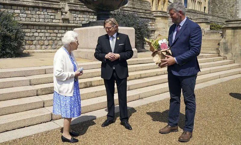 Queen Elizabeth has received a commemorative rose to mark what would have been the 100th birthday of the Duke of Edinburgh