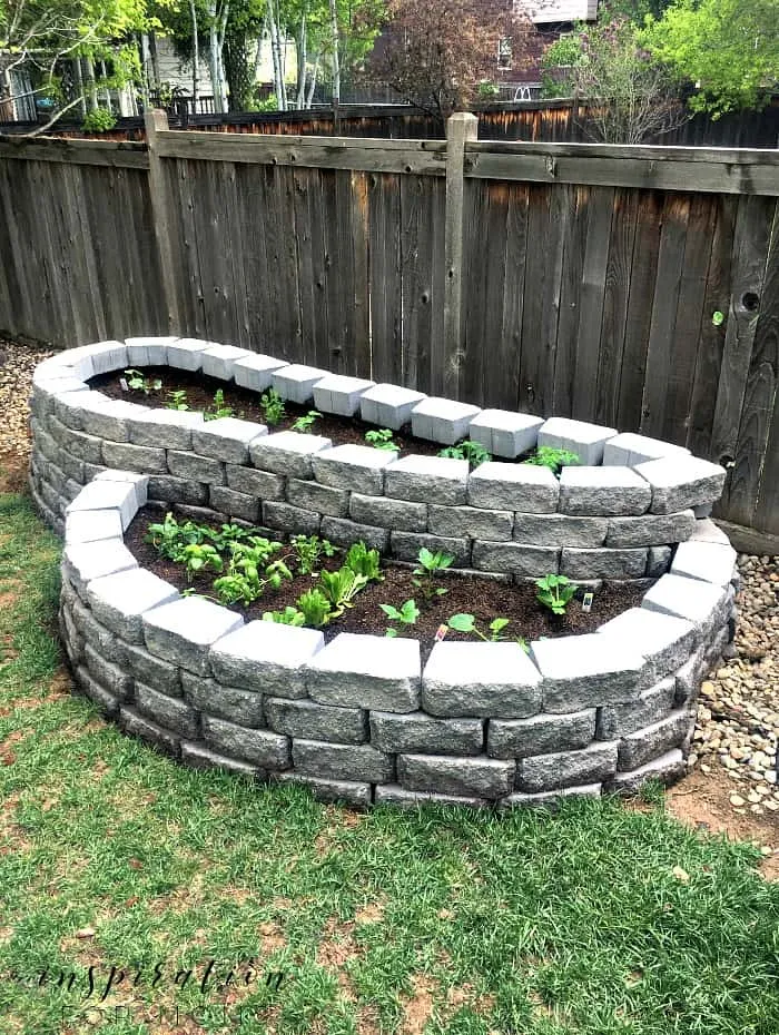 Raised outdoor garden with stone