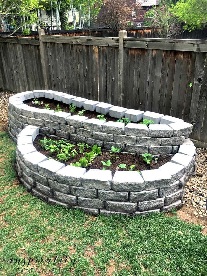 Raised outdoor garden with stone