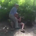 Horny grandpa caught on camera receiving a sex act from a woman in the middle of a public park (video)