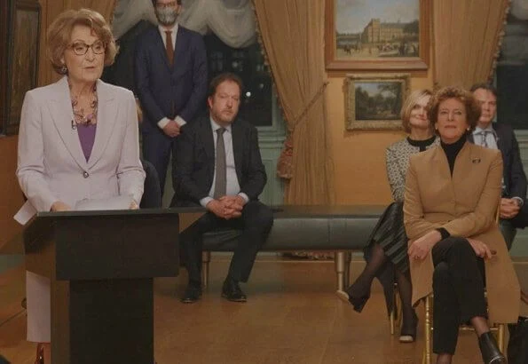 Princess Margriet is honorary president of the Dutch Red Cross. Princess wore a lilac blazer and skirt suit. She carries lilac satin clutch bag