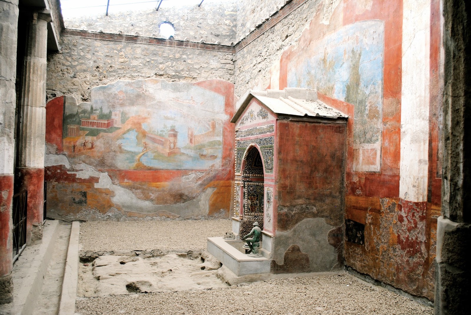 House with the small fountain in Pompeii Italy
