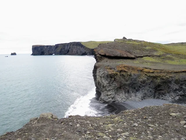 Sea cliffs near Dyrhólaey Peninsula are an ideal terminus to a self-drive day trip along the South Coast of Iceland