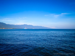 Blue Sky Tropical Beach Panorama With Calm Ocean Waves In The Morning At Umeanyar Village North Bali Indonesia