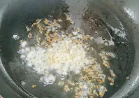 Sauteing cumin garlic and onion for palak paneer recipe