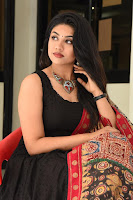 Telugu Actress Malavika Satheesan Photos in Churidar Dress at Bommala Koluvu Movie Trailer Launch. HeyAndhra.com
