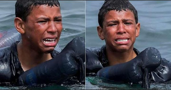 Weeping migrant boy swims from morrocco to spain using plastic bottles to stay afloat