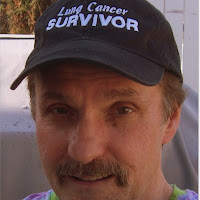 baseball style hat embroidered with "lung cancer survivor"
