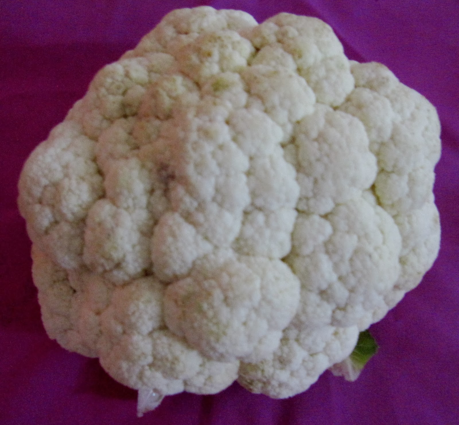 Sita's Ruchulu Cauliflower whole cauliflower cooked in curd (yogurt)