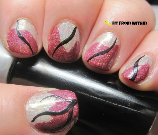 A black striper winding diagonally down the nail completed the look