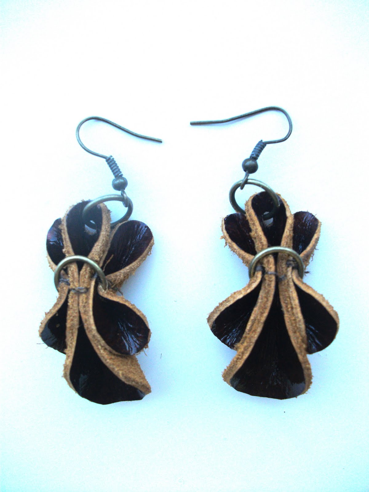 Claire Fitzjohn Some new designs.... leather earrings and