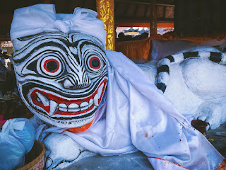 Tiger Guard Statue In The Hindu Family Temple Decorated With Cloth In Galungan Ceremony At Ringdikit Village North Bali Indonesia