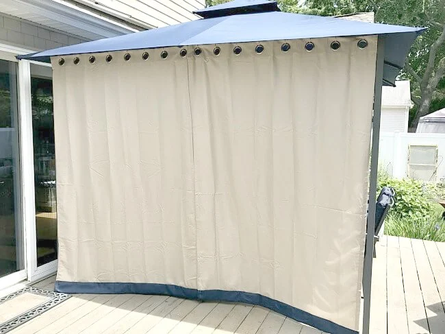 Gazebo curtains closed for sun protection