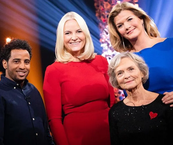 Crown Princess Mette-Marit wore Dolce & Gabbana red contrast-stitch cady dress. Princess Ingrid Alexandra at event of Church City Mission