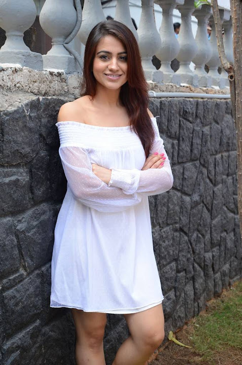 Aksha Pardasany in white dress
