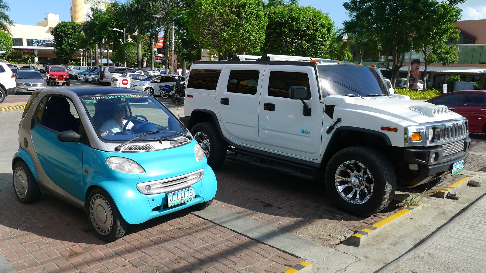 adventures in sustainability: The Smart Car and the Hummer in Cebu