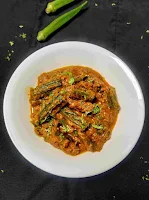Serving bhaba style bhindi masala in a bowl