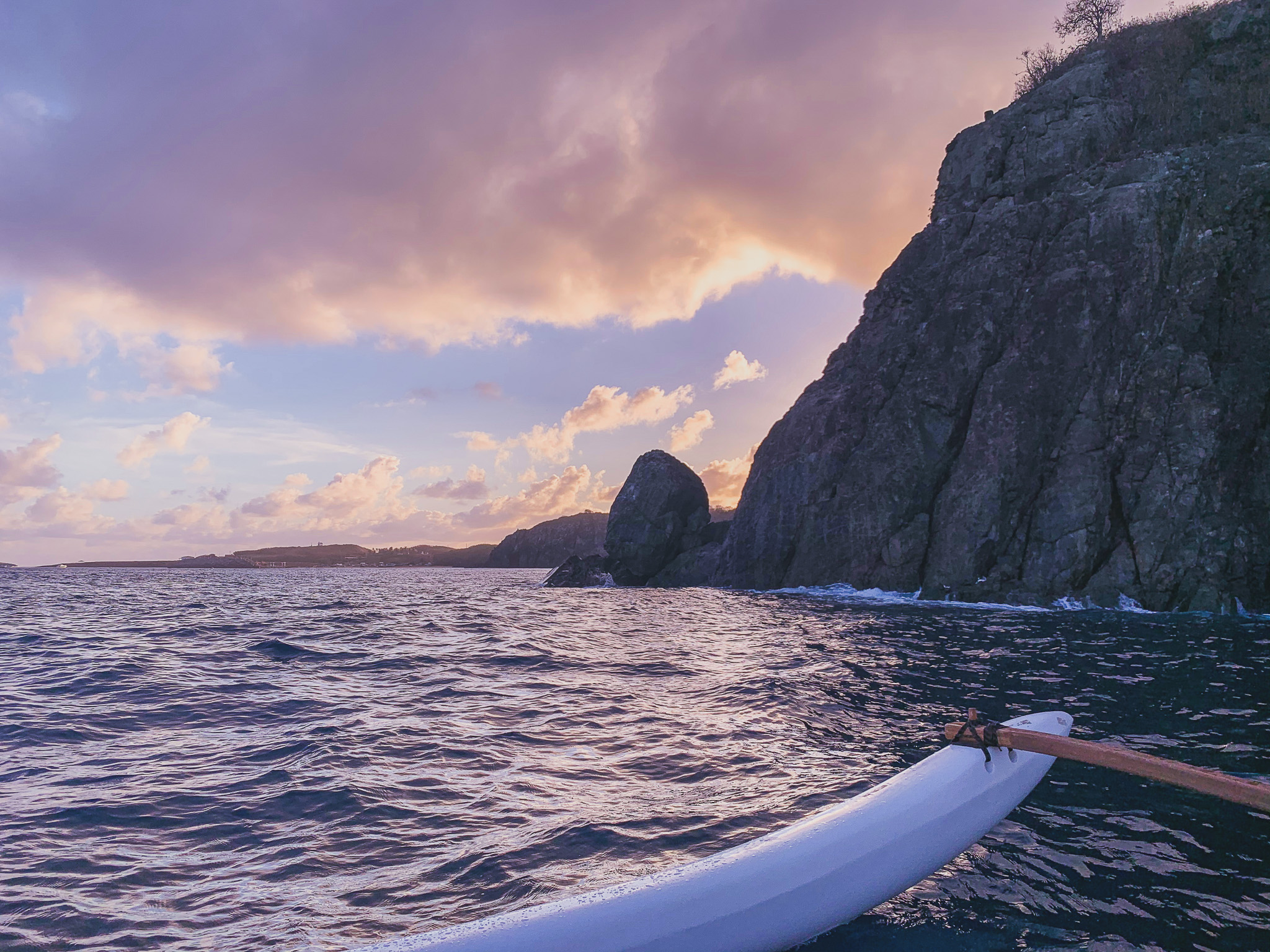canoeing at sunset time in Noronha, Brazil