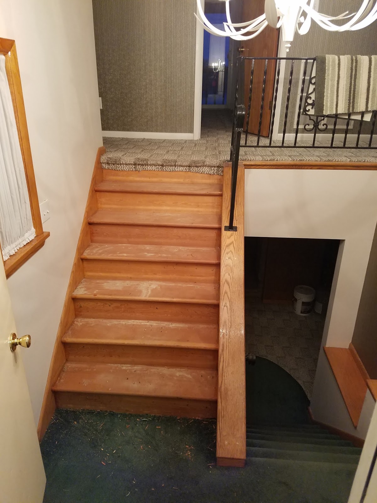 Before and After of our Lake House Stairs and Landing Corner of Plaid