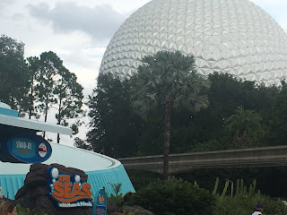 The Seas With Nemo and Friends With Spaceship Earth in the Background Epcot Disney World
