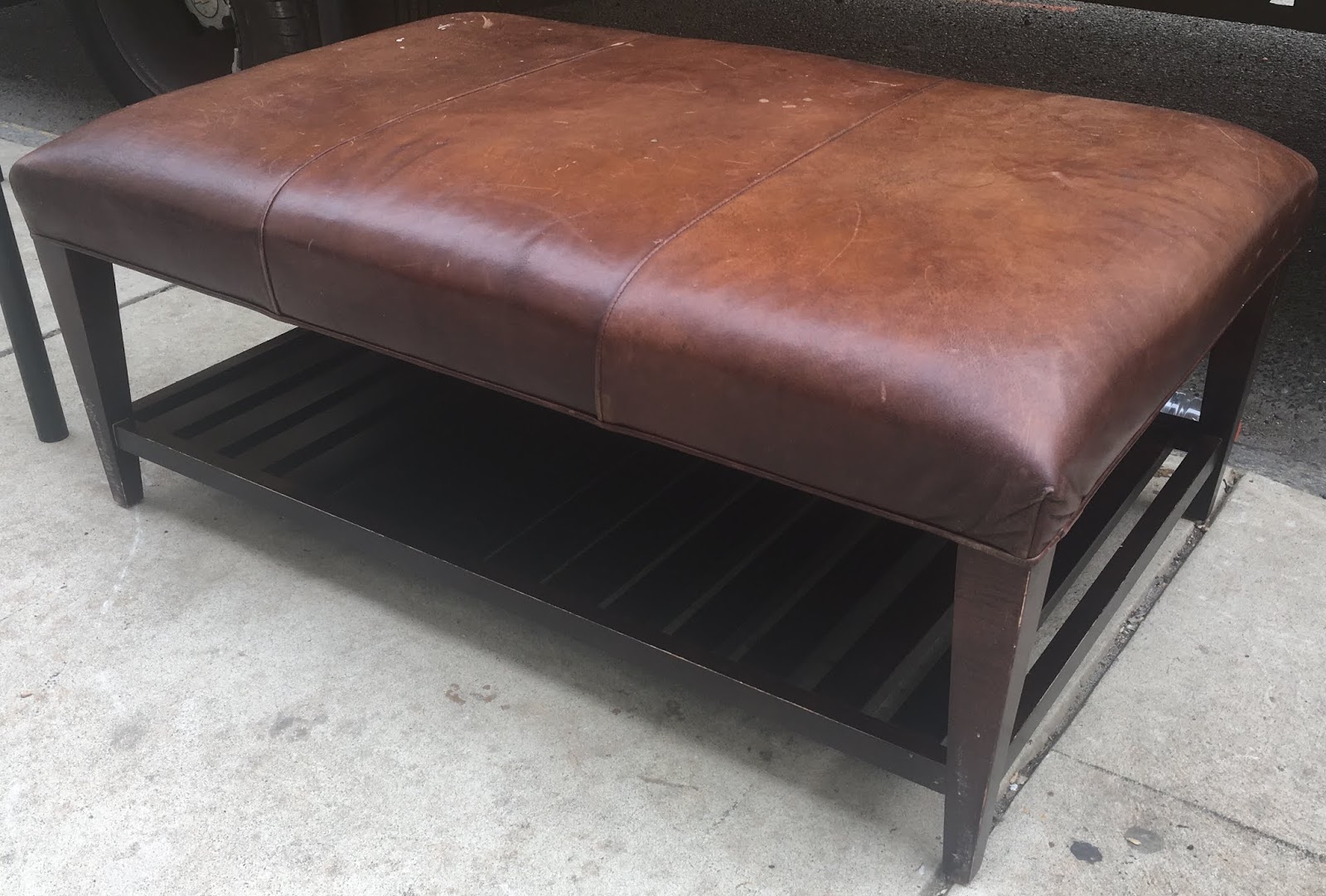 Uhuru Furniture & Collectibles Large Leather Ottoman with Lower Shelf