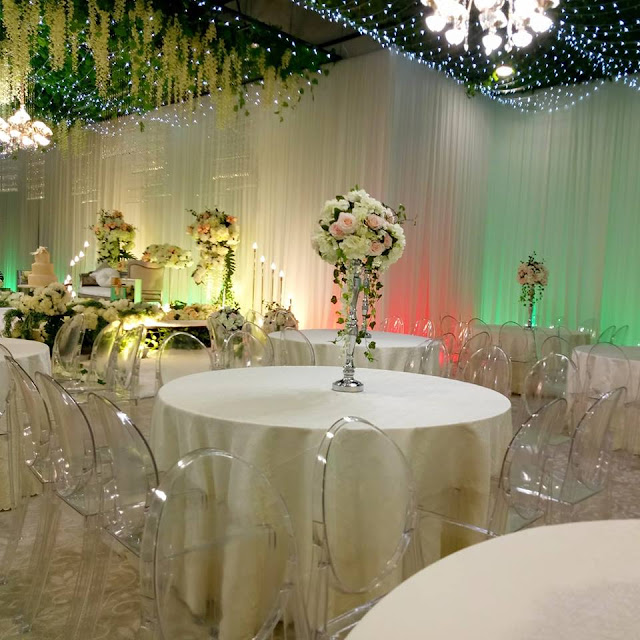 ghost chairs, hanging fairy lights