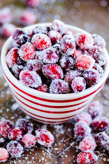 These sweet cranberries are as easy to make as they are beautiful. The perfect topping for a beautiful holiday cake or drink, or even to serve as an appetizer.