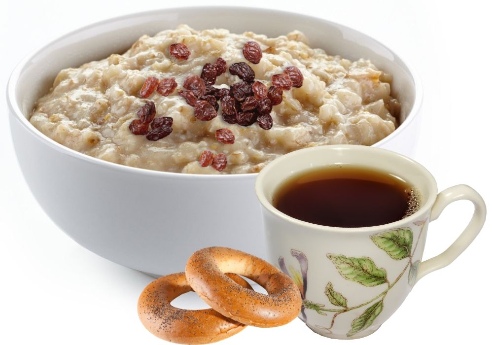 чашка с овсяными хлопьями. каша с фруктами. каша на завтрак. овсянка чай. овсянка чай.