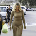 Khloe Kardashian suffers a wardrobe malfunction as she wears an ultra-tight dress